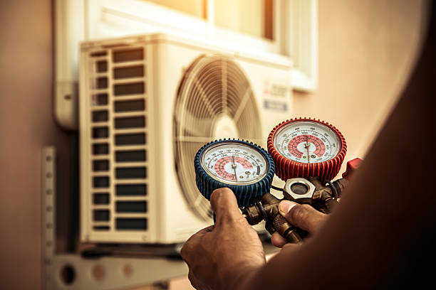 Professional Hvac technician working in Docena, AL